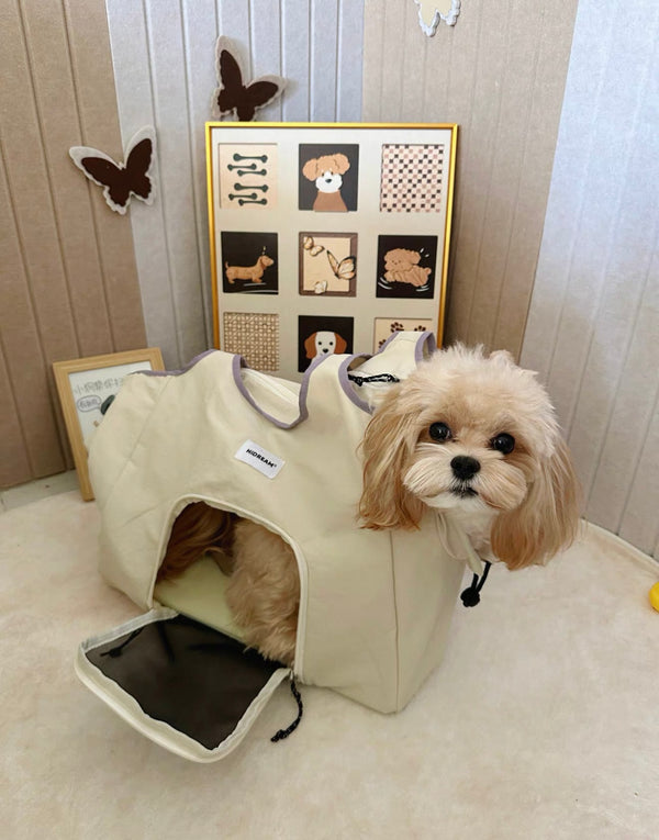 Structured sides help the carrier keep its shape while giving your pet space inside.