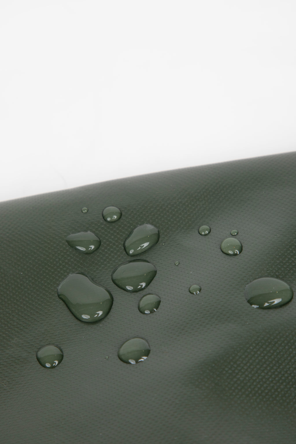 Water-resistant fabric detail on a pet shoulder carrier bag